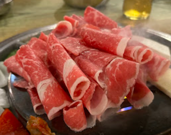 Kang Ho Dong Baekjeong signature dishes Prime Boneless Short Rib
Thinly Sliced Spicy Pork Belly
Japchae